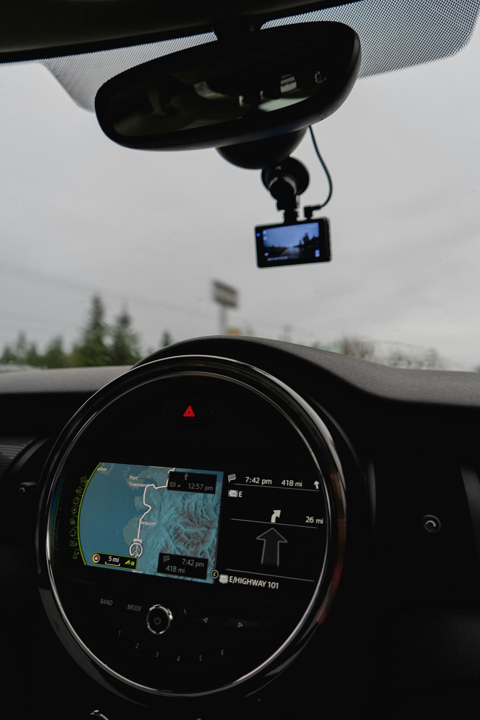 Close-up of a vehicle dashboard GPS navigation screen displaying a map