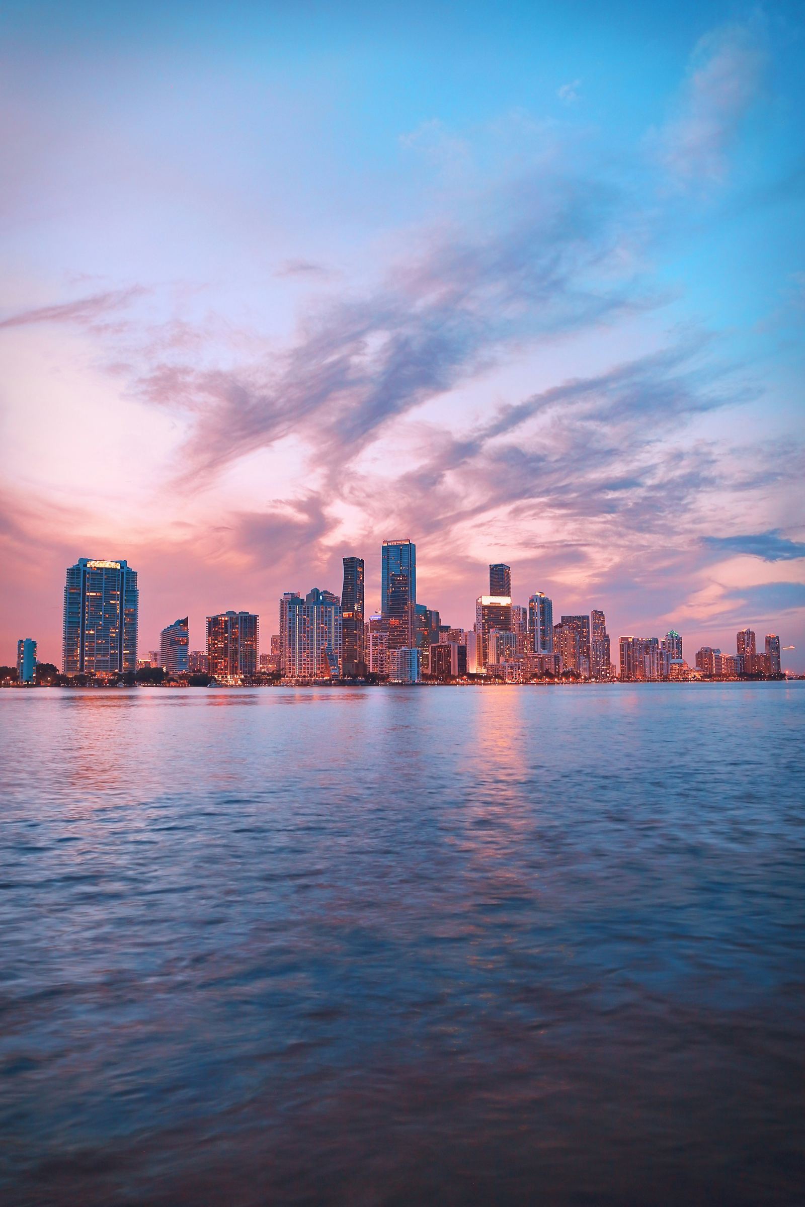 Miami skyline and waterfront illuminated at sunset
