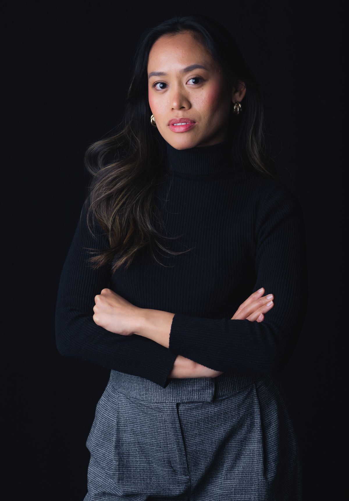 Confident businesswoman portrait, representing a new NEMT business owner